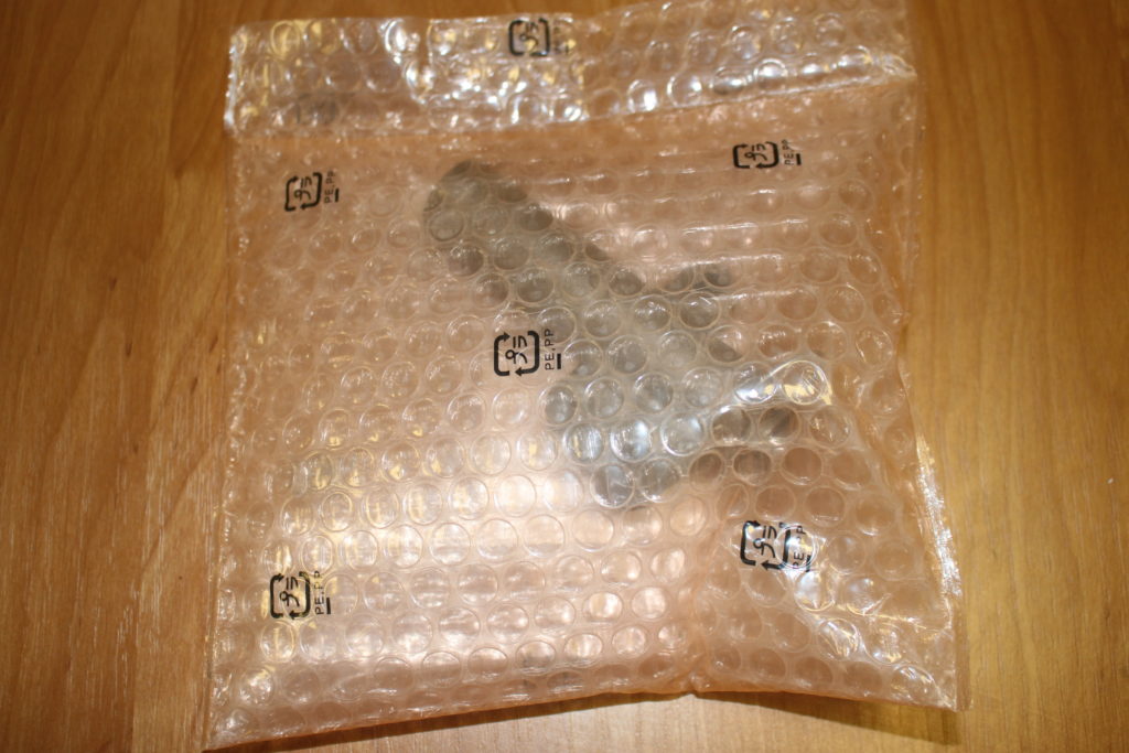 MD308086 MITSUBISHI — в упаковке натяжитель, вид сзади