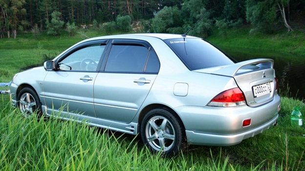 Ветрозащитные решетки Mitsubishi Lancer 9